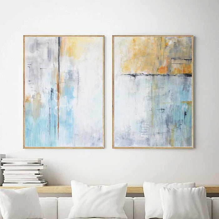 Set of Two Blue White Abstract Diptych Paintings above couch