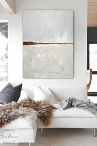 vertical minimal art on canvas above couch